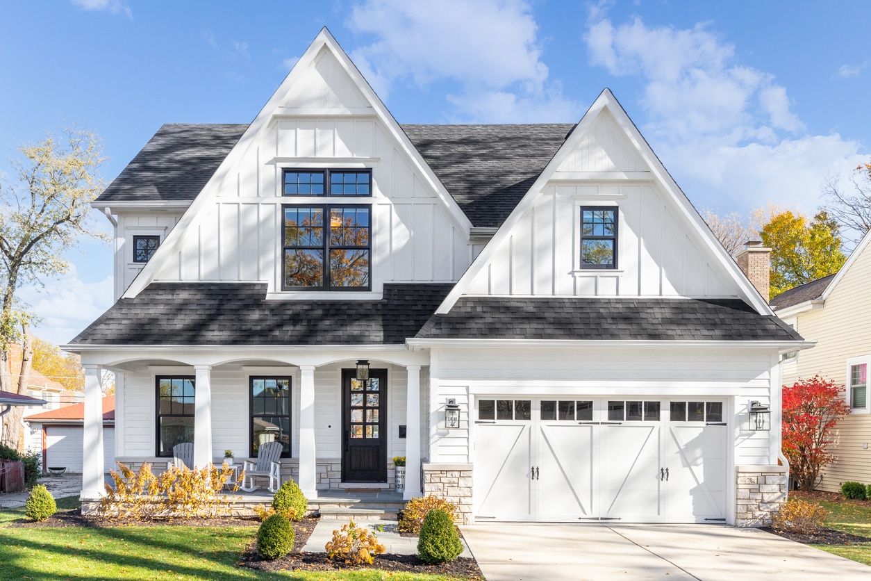 New farmhouse-style home built between established neighbors